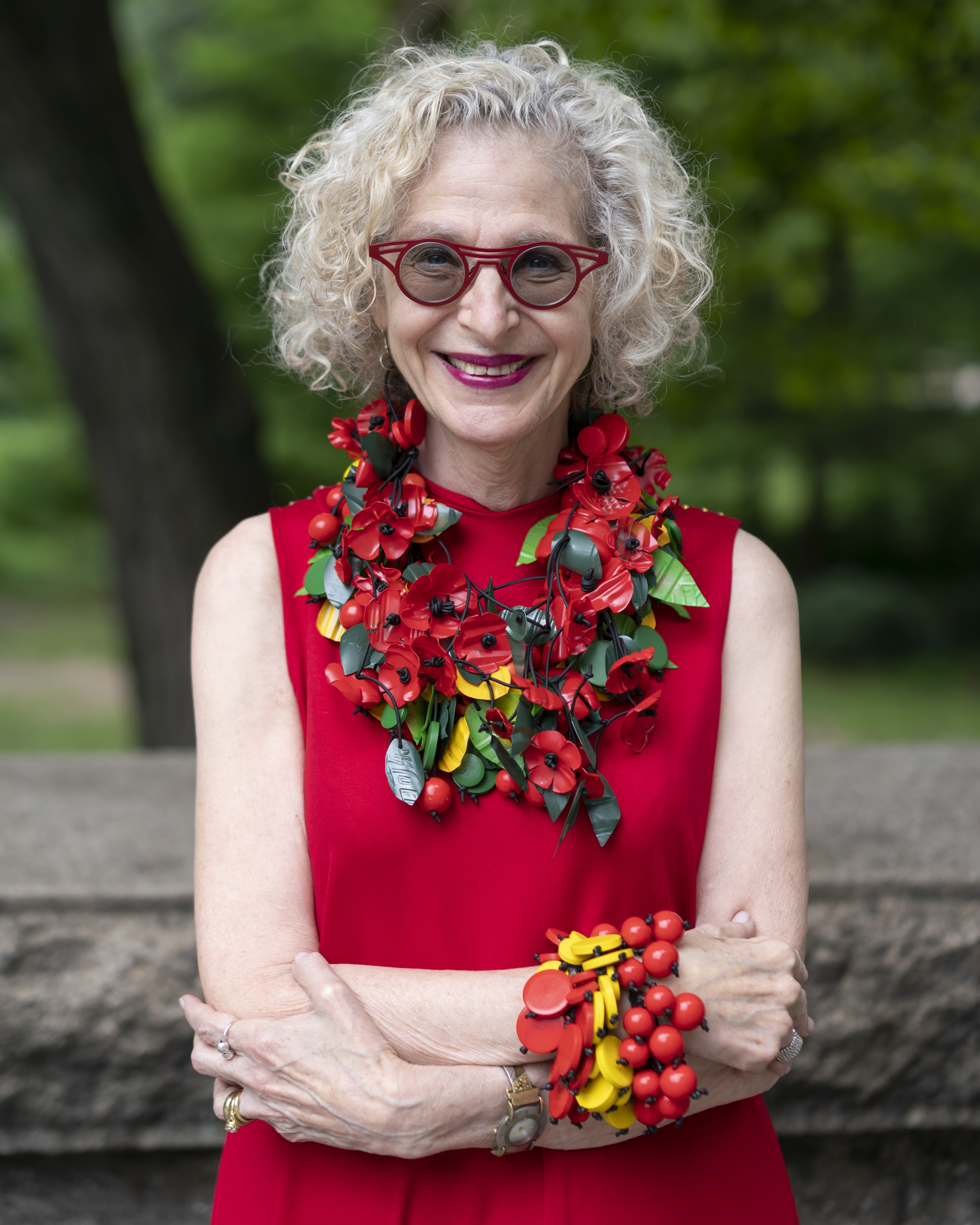 White model wearing colorful necklace and bracelet from Jianhui