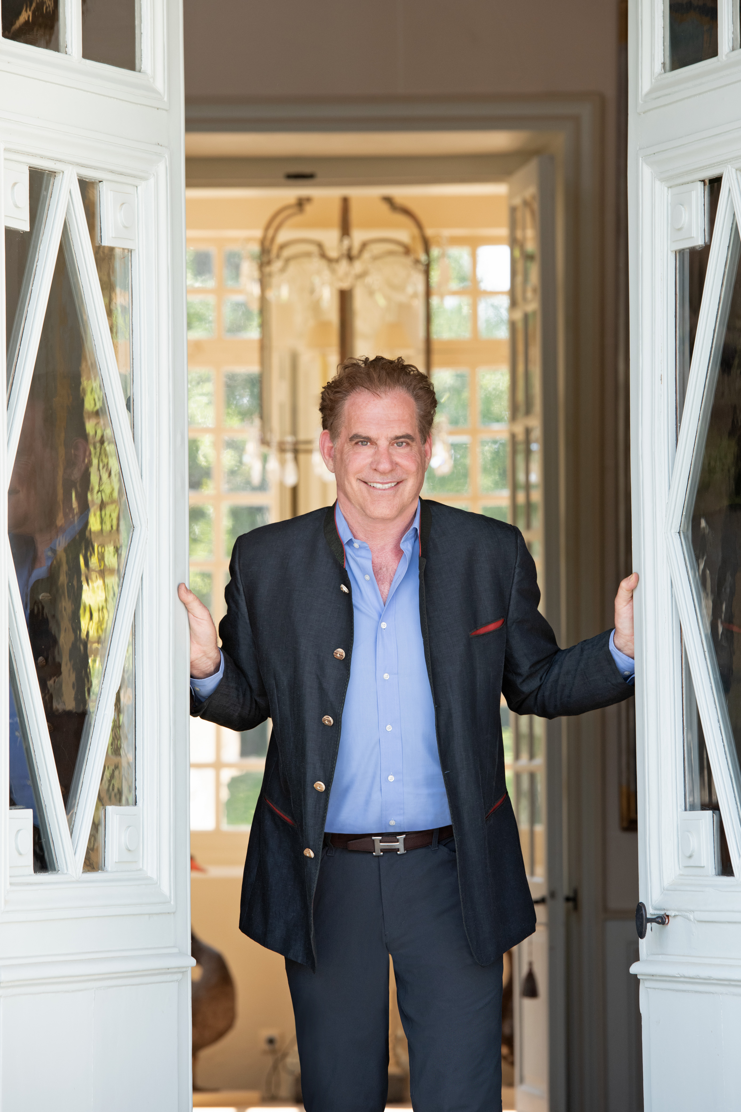 Image of Timothy Corrigan posing in a door entryway.